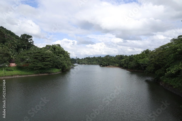Fototapeta river and clouds