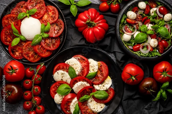 Fototapeta Diet and healthy tomato salads with arugula, cherry tomatoes, burrata, mozzarella cheese