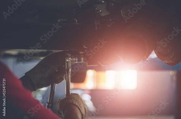 Obraz Mechanic repairing a car