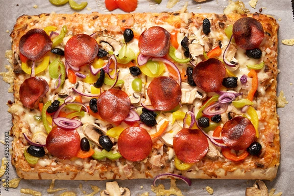 Obraz Delicious Homemade rectangular pepperoni and vegetables pizza