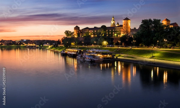 Fototapeta Krakow, Poland. View of the Wawel and the Vistula River at sunrise. Widok na Wawel i rzekę Wisłę o wschodzie słońca.