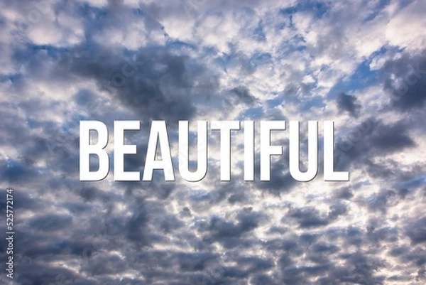 Fototapeta BEAUTIFUL - word on the background of the sky with clouds.