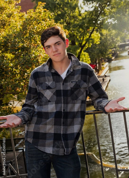 Obraz Handsome young man standing with open arms