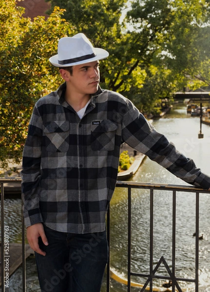 Obraz Stylish looking young man wearing a white hat.