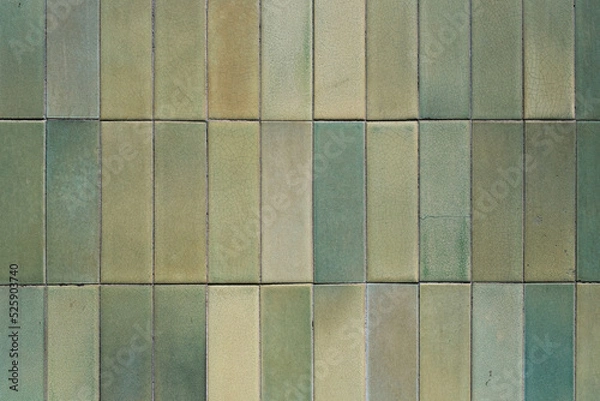 Obraz Texture and pattern of a green ceramic wall tiles, grunge square mosaic close up, background, retro facade of the building.