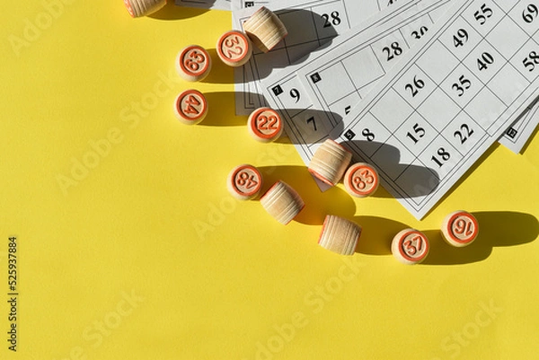 Fototapeta Russian Lotto on a yellow background with space for text. Board games in summer