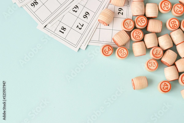 Fototapeta Russian lotto on a blue background with a space for text. Board games in summer