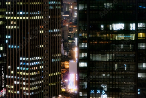 Fototapeta Close up view of skyscrapers of Umeda district in central Osaka, Japan. Umeda is a major commercial, business, shopping and entertainment district and the city's main northern railway terminus