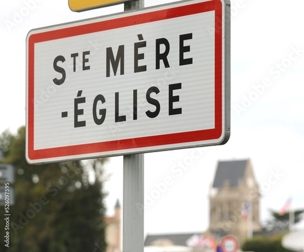 Fototapeta sign with the words STE MERE EGLISE in FRANCE  indicating a place of the D-DAY D-DAY landing in WWII