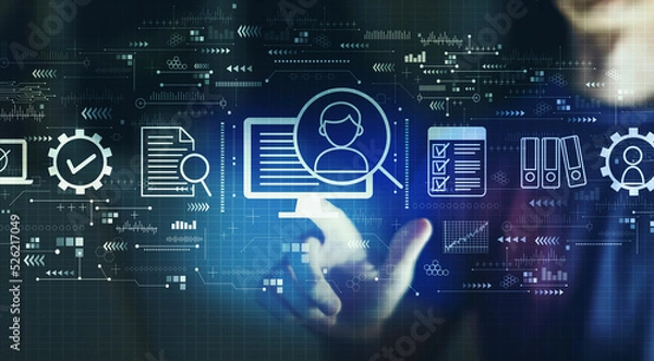 Fototapeta Document management system concept with young man touching a digital screen at night