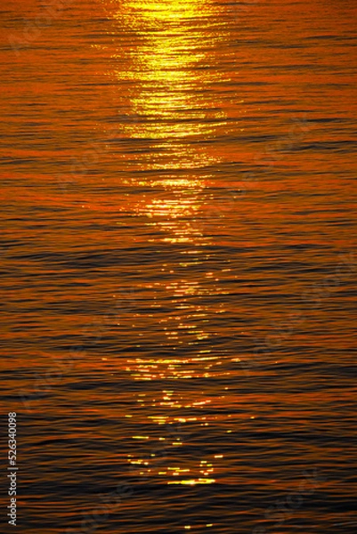 Obraz Background of the reflection of the sun on the surface of sea water.