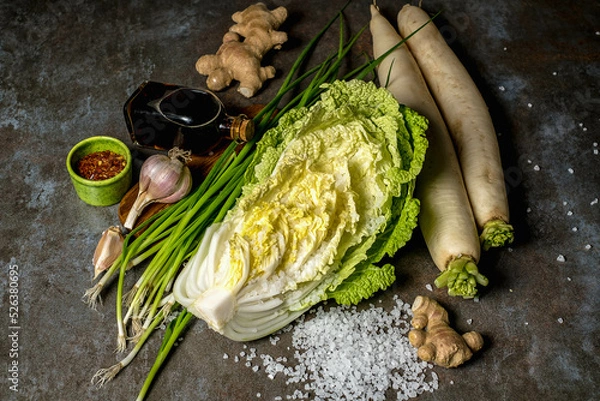 Fototapeta Napa cabbage or Chinese cabbage Fresh ripe chinese cabbage on a stone table, top view