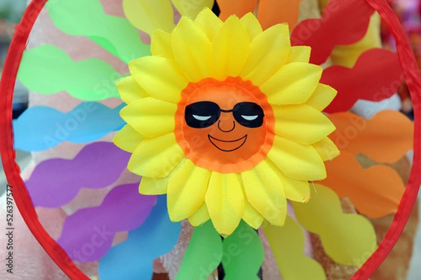 Fototapeta A small windmill, a child's toy