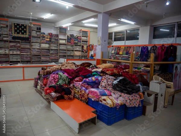 Obraz woolen clothes store, dress material shop for winter.