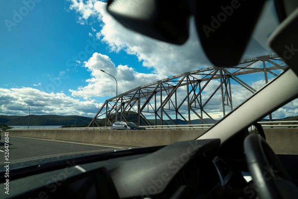 Fototapeta A shot of Iron Cove Bridge from inside of a driving car, Sydney Australia