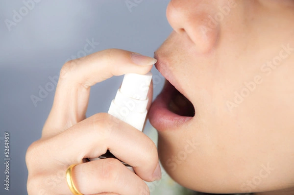 Fototapeta Closed up spray on mouth