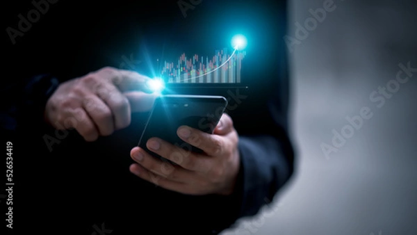 Obraz Business Analysis Concepts, Problem Solving and Planning Businessmen Financial Analysts working on digital tablet It is analyzing sales data and economic growth chart.