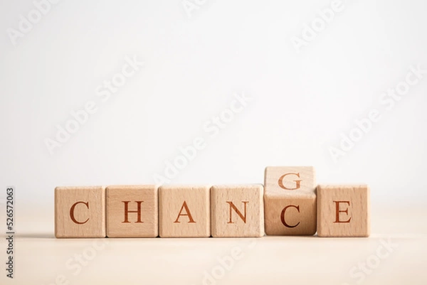 Fototapeta Wooden cube with word change to chance, Personal development and career growth or change yourself concept.