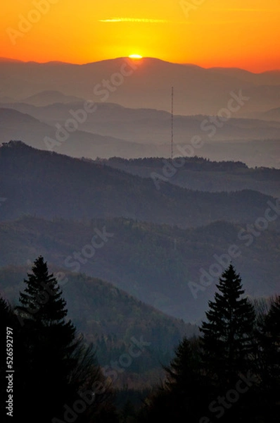 Obraz Sun is coming up from behind the mountains in the early morning, view from Králiky, Slovakia