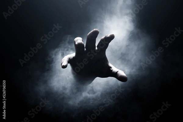 Obraz Human hand on dark background