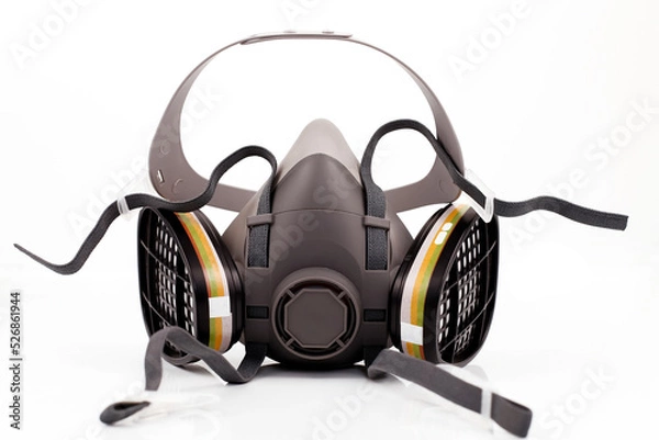 Obraz Reusable half-face elastomeric respirator for air purification with replaceable filters on a white background
