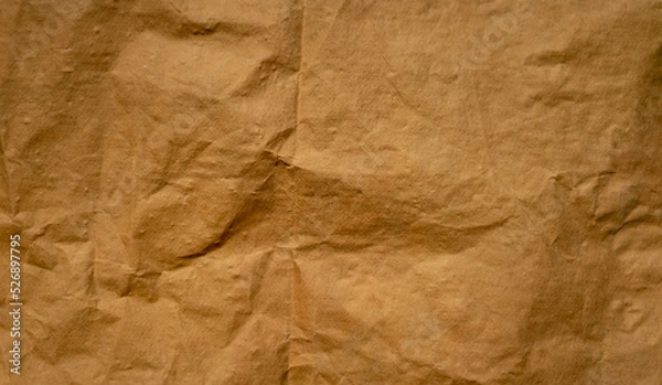 Fototapeta golden old paper with torn and crumpled texture for background