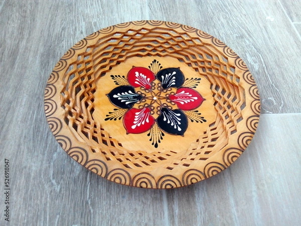 Fototapeta Ornamental wooden plate with traditional Romanian motif