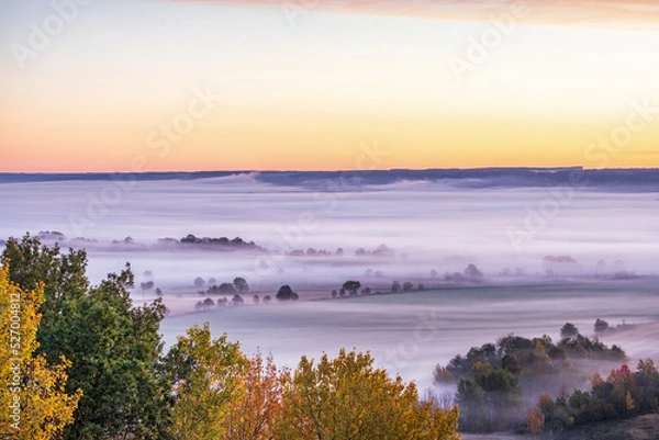 Fototapeta View of a rural landscape with morning fog in autumn