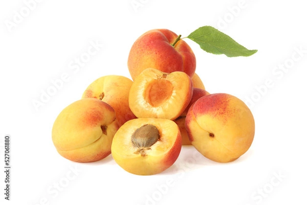 Fototapeta Ripe apricots with leaf isolated on white
