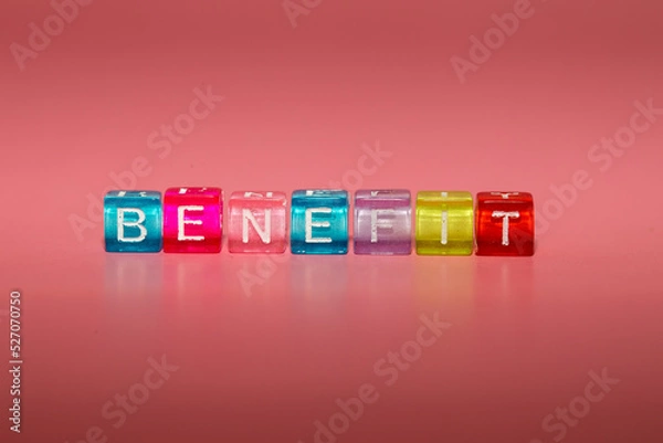 Fototapeta The word "benefit" made up of cubes