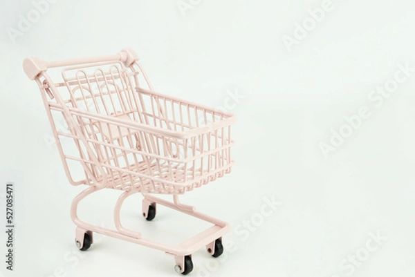 Obraz Classic light pink shopping cart isolated on white background.