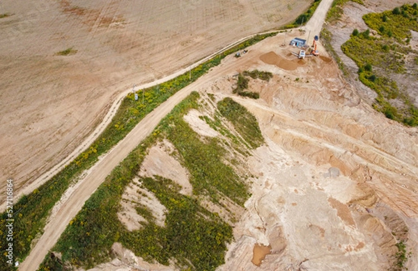 Fototapeta Aerial view of the mining quarry. Industrial landscape sand and desert.