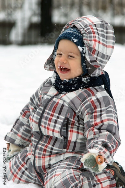 Obraz Boy playing in snow