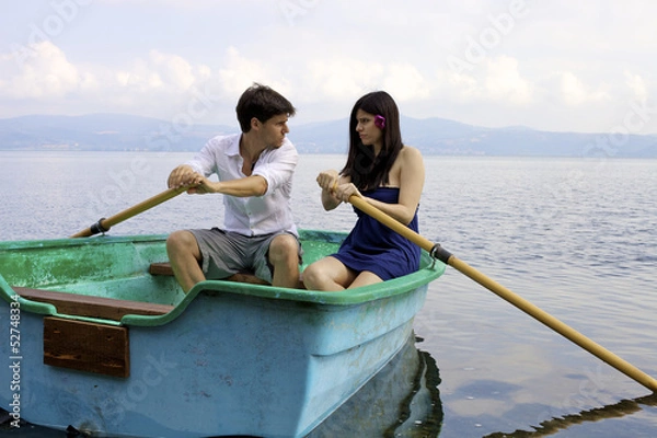 Obraz Husband angry with wife not able to row on boat