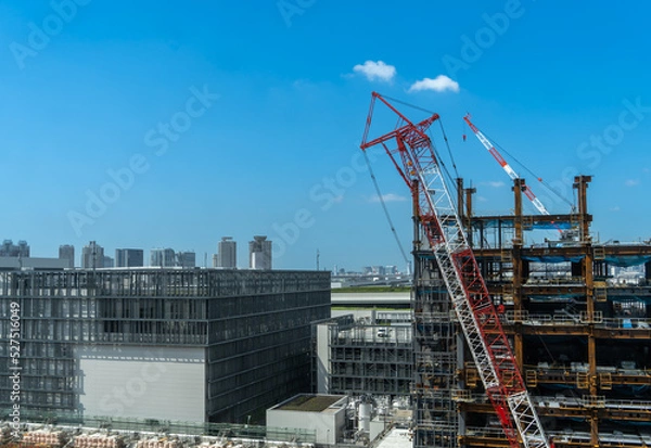 Obraz 再開発進む湾岸、豊洲エリアの建設現場、クレーン車