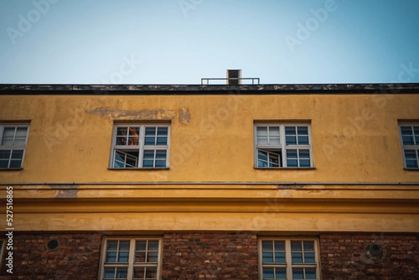 Obraz Old worn building exterior with bricks