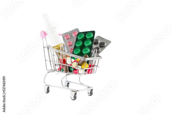 Fototapeta There are three blisters, a spray and tablets individually in a cart on a white background