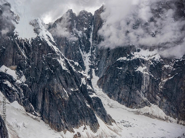Fototapeta Mountains with Glacier and Clouds