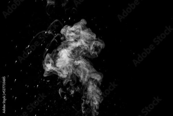 Fototapeta vapor steam rising over black background to overlay on your photos. Splashes and drops of water. Curly white steam rising up and splashing water scattering in different directions