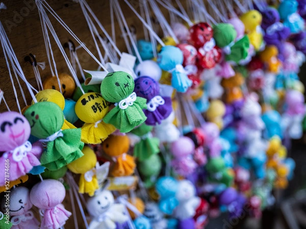 Fototapeta colorful of lucky charms for good weather displayed at a shinto shrine in tokyo, Japan