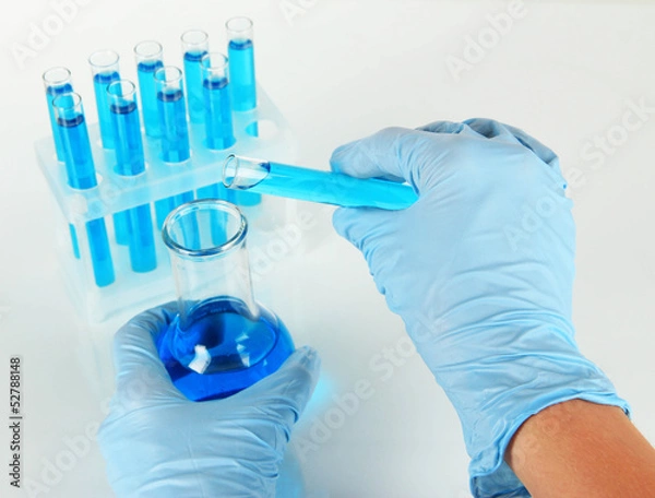 Fototapeta Scientist working at laboratory isolated on white