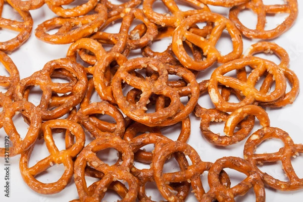 Fototapeta salted pretzels on white background