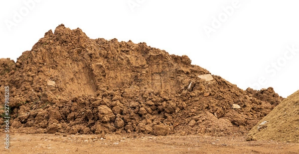 Fototapeta Brown mound isolates dug up and left on the ground to prepare for landfill to improve construction in rural Thailand.