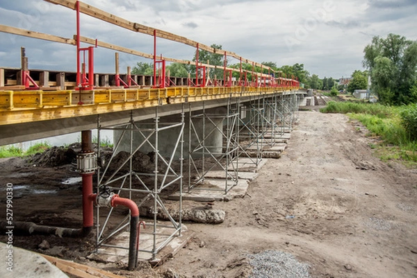 Fototapeta Support scaffolding system at bridge construction.