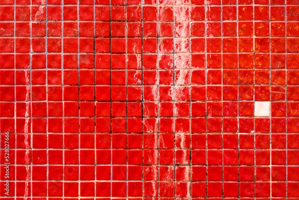 Obraz Small red dirty ceramic tiles on the building facade, retro mosaic wall surface, grunge texture and pattern, background.