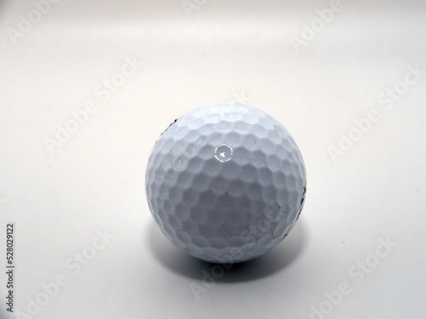 Obraz A golf ball shot in the studio on a white background
