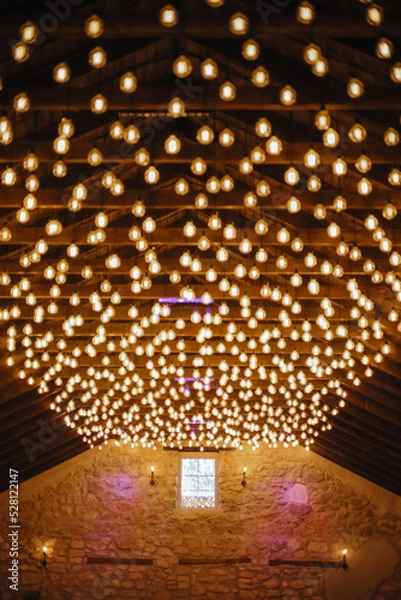 Obraz starry ceiling. multiple light bulbs on wooden ceiling. High quality photo