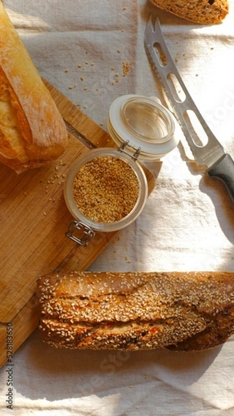 Obraz bread with sesame seeds and knife