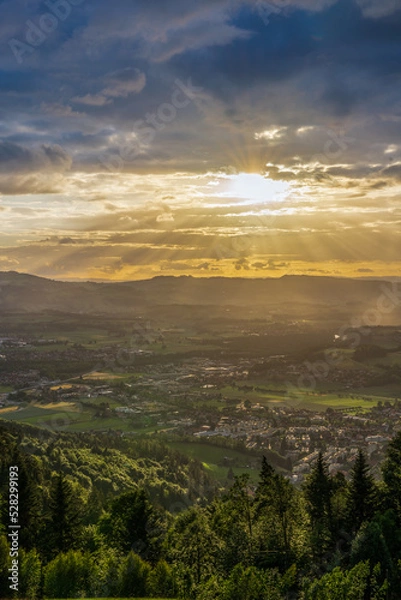 Obraz sunset over the fields in stormy clouds