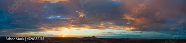Obraz A beautiful clouded sunset over the Mojave desert. 
